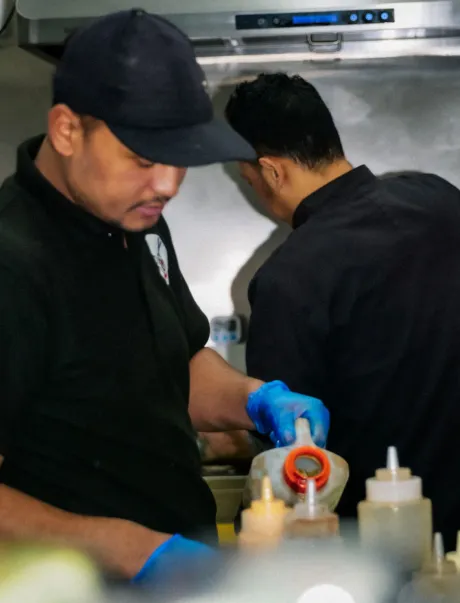Employees working in kitchen