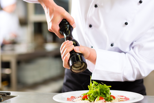 restaurant chef seasoning salad